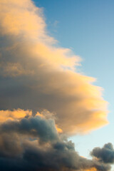 Fototapeta na wymiar Clouds With Color Over A Blue Sky