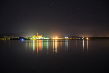 sky full of stars over a lake