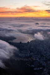 Fototapeta premium Beautiful sunrise view from Corcovado Mountain to Sugar Loaf and city