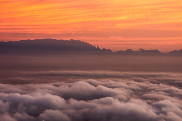 Beautiful sunrise view from Corcovado Mountain with orange clouds