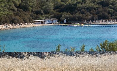 empty stone floor in front of beach background