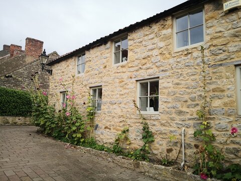 Stone cottage side view, Helmsley, North Yorkshire, UK