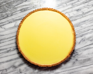 Plain Lemon Tart on White Marble