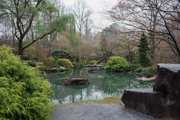 Fototapeta na wymiar Japanese garden blooming in springtime at Gibbs Garden in Georgia