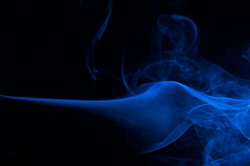 abstract blue smoke on black background