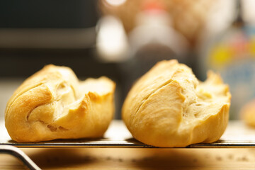 Fresh baguette bread sticks from the oven on a grate
