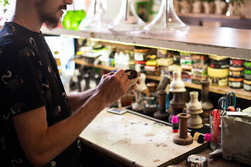 man doing the hookah with a tobacco, traditional eastern aroma smoking