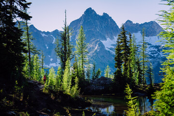 Strong female hiker on alpine adventure in the North Cascades NP