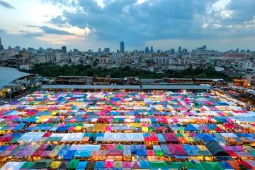 Tuinposter colourful Sales of second-hand market in Bangkok © Cavan