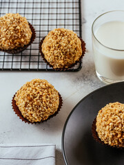 homemade desserts with caramel, nuts on a light background