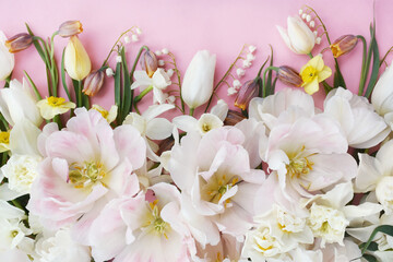 Naklejka na ściany i meble Spring blossoming tulips, pink, white and light yellow flowers festive background, bright springtime bouquet floral card
