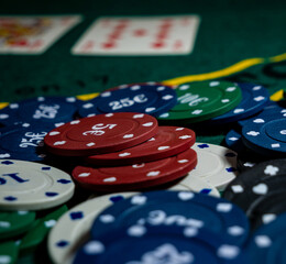 poker card game chips on a green table