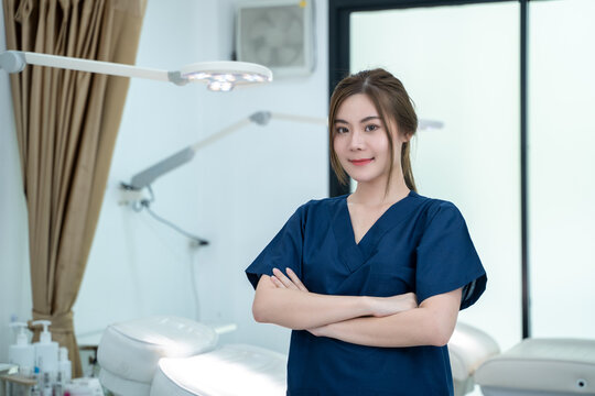 Portrait of beautiful female doctor standing in beauty salon