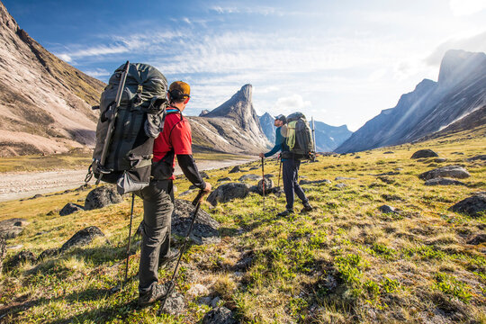 Backpackers stop to enjoy the views during a multi-day trip