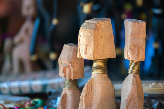 Wooden figurines portraying Kayan women, near Loikaw, Myanmar