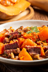 Dried meat with pumpkin. Tipical brazilian dish.