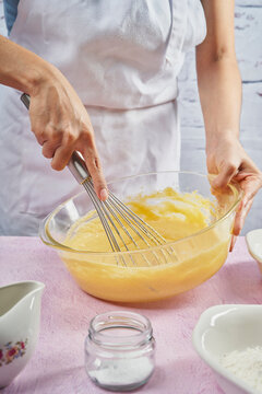 Prepared cornstarch alfajores. Beating the dough to prepare the dessert