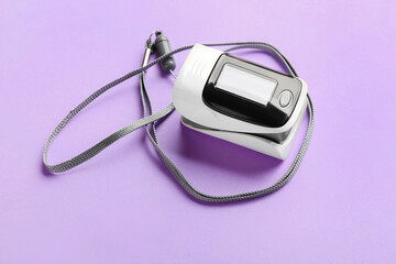 Pulse oximeter on color background