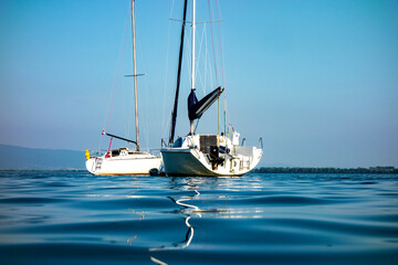Fototapeta premium Sailboat moored in the harbor for boats, yachts and sailboats in a recreational destination