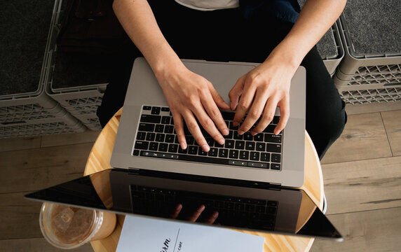 Typing at a Cafe on a Computer