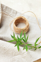 Hemp cloth with threads on grunge background, closeup