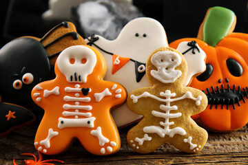 Tasty cookies for Halloween celebration on table