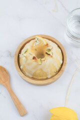 Lemon cake with sugar frosting on marble table. Healthy dessert. Delicious breakfast, traditional tea time treat. Modern summer food minimal concept, copy space