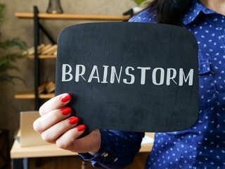  Financial concept meaning BRAINSTORM with inscription on the sheet.