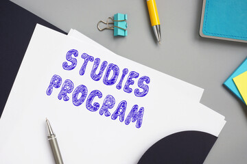 Business concept about STUDIES PROGRAM with sign on the sheet.