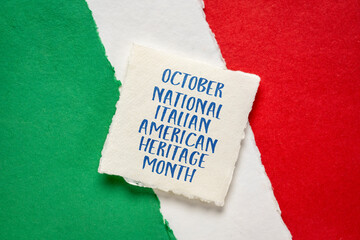 October - National Italian American Heritage Month, handwriting on handmade paper against abstract...