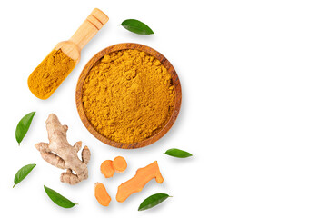 Turmeric powder in wooden bowl with turmeric root and leaves isolated on white background. Top view