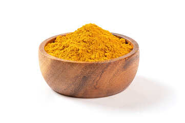 Turmeric powder in wooden bowl on white
