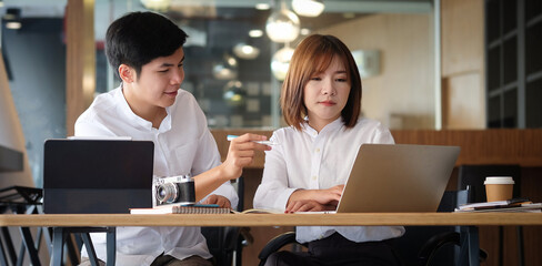 Businesspeople working on their project together in office room...