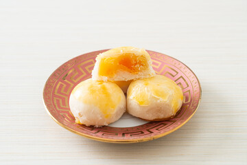 Chinese pastry moon cake with salted egg peanut or Spring Roll pastry with nuts and salted eggs