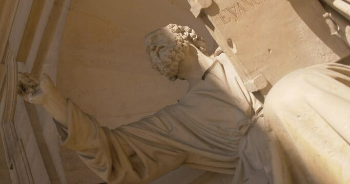 closeup of a statue of saint peter from Saint Sulpice church, Paris
