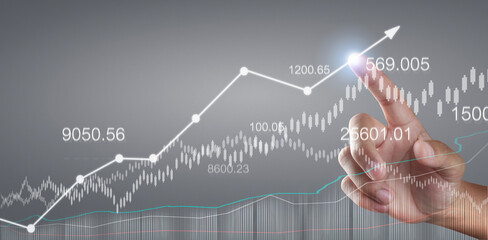 Touching graphs of financial indicator and accounting market economy analysis chart