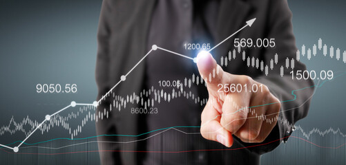 Touching graphs of financial indicator and accounting market economy analysis chart