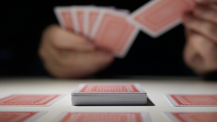 Gambling, Betting, and Winning. Playing Cards Games. One Person Playing Cards and Having Fun. Gamble Competition Gaming Cards.