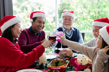 Happy family celebrating together at Christmas day at home, Christmas celebration concept