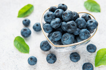 Blueberries on concrete background