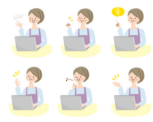 パソコンを操作するミドル女性　ポジティブな表情セット