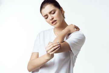 Obraz premium sick woman in white t-shirt pain health problems dissatisfaction