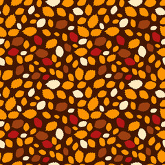 Seamless cute autumn pattern with fall leaves in warm color. Dark background