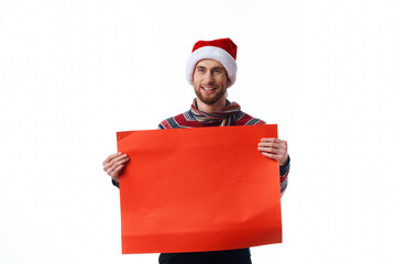 Cheerful man in a christmas hat with Red mockup poster copy-space studio