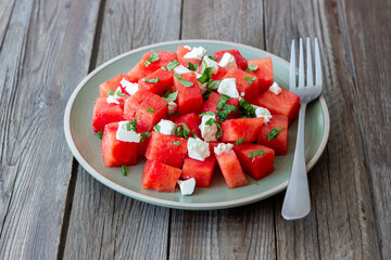 Salad with watermelon, white cheese and mint. Healthy eating. Vegetarian food.