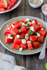 Salad with watermelon, white cheese and mint. Healthy eating. Vegetarian food.