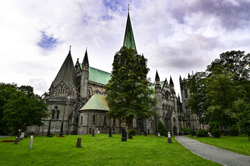 Fototapeta na wymiar Nidaros cathedral in Trondheim with dramatic sky 