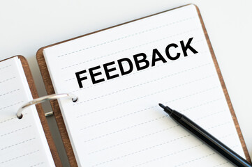 Feedback text on a notepad on a white background. You feedback matters, review concept. Appraisal or performance