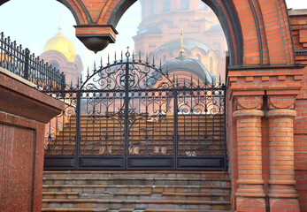 The red brick arch of the Alexander Nevsky Cathedral in Novosibirsk