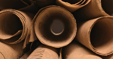 Ancient scribe library. Futhpak scrolls stacked on a pile.